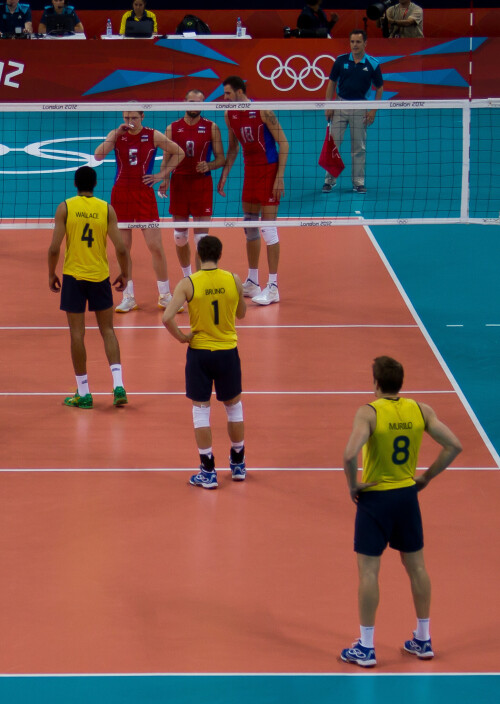 London 2012 - Volleyball - Men's Final

Brazil v Russia in the Men's gold medal final.

Russia looked a little sluggish to start with (they changed their setter halfway through the match so you knew things weren't going right for them), and Brazil won the first two sets easily.  They even had two match points in the thrid set, but they came when Brazil were in their weaker rotations and Russia were in their stronger, and they managed to edge the 3rd.

This triggered a massive turnaround for Russia.  Having snuck the third set, they carried their momentum into the 4th.  The Great Bear was awakened.  Brazil then brought on Giba, but he looked out of sorts, and Russia started to pepper him with serves and stuff him out on the block.  This completely changed the match, and Russia raced to the 4th set, then took a big lead in the 5th, going on to win 19-25, 20-25, 29-27, 25-22, 15-9.

Wallace, Bruno and Murilo (player of the tournament for me).