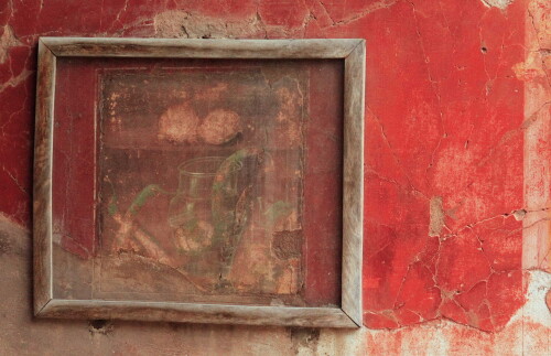 This was in Herculaneum - There were these pictures painted on the remains of the walls, so someone had just stuck a frame round it.  Nice