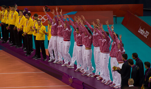 London 2012 - Volleyball - Men's Final

Brazil v Russia in the Men's gold medal final.

Russia looked a little sluggish to start with (they changed their setter halfway through the match so something wasn't right), and Brazil won the first two sets easily.  They even had two match points in the thrid set, but they came when Brazil were in their weaker rotations and Russia were in their stronger.

This triggered a massive turnaround for Russia.  Having snuck the third set, they carried their momentum into the 4th.  The Great Bear was awakened.  Brazil then brought on Giba, but he looked out of sorts, and Russia started to pepper him with serves and stuff him out on the block.  This completely changed the match, and Russia raced to the 4th set, then took a big lead in the 5th, going on to win 19-25, 20-25, 29-27, 25-22, 15-9.

Russia wave to their fans.