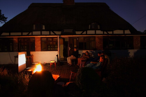 I've always wanted to do this, so after 4 years (6 months of which were waiting for a dry weekend) we watched a film in the garden.  I'd also bought a firepit which over-exposed the photo nicely.