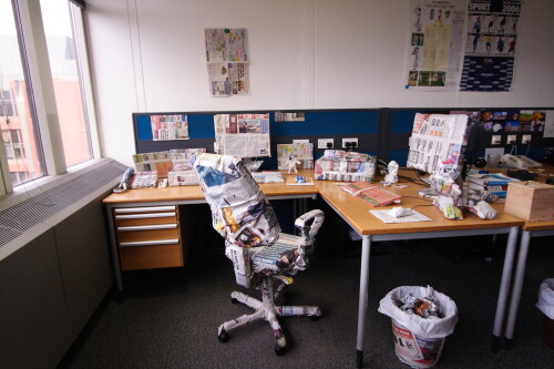 Brian went on holiday for a fortnight, so we wrapped everything on his desk in newspaper.