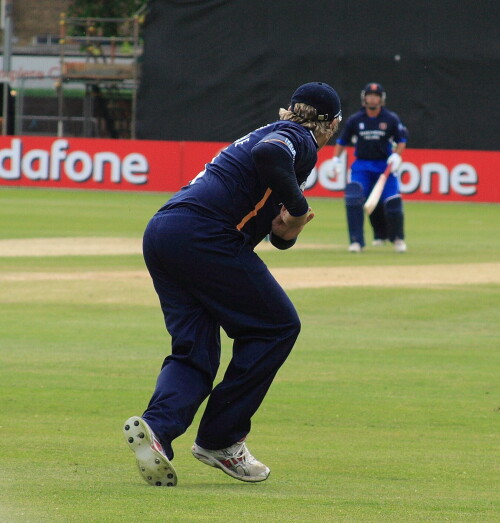 Cosgrove (Glamorgan) fields the ball.